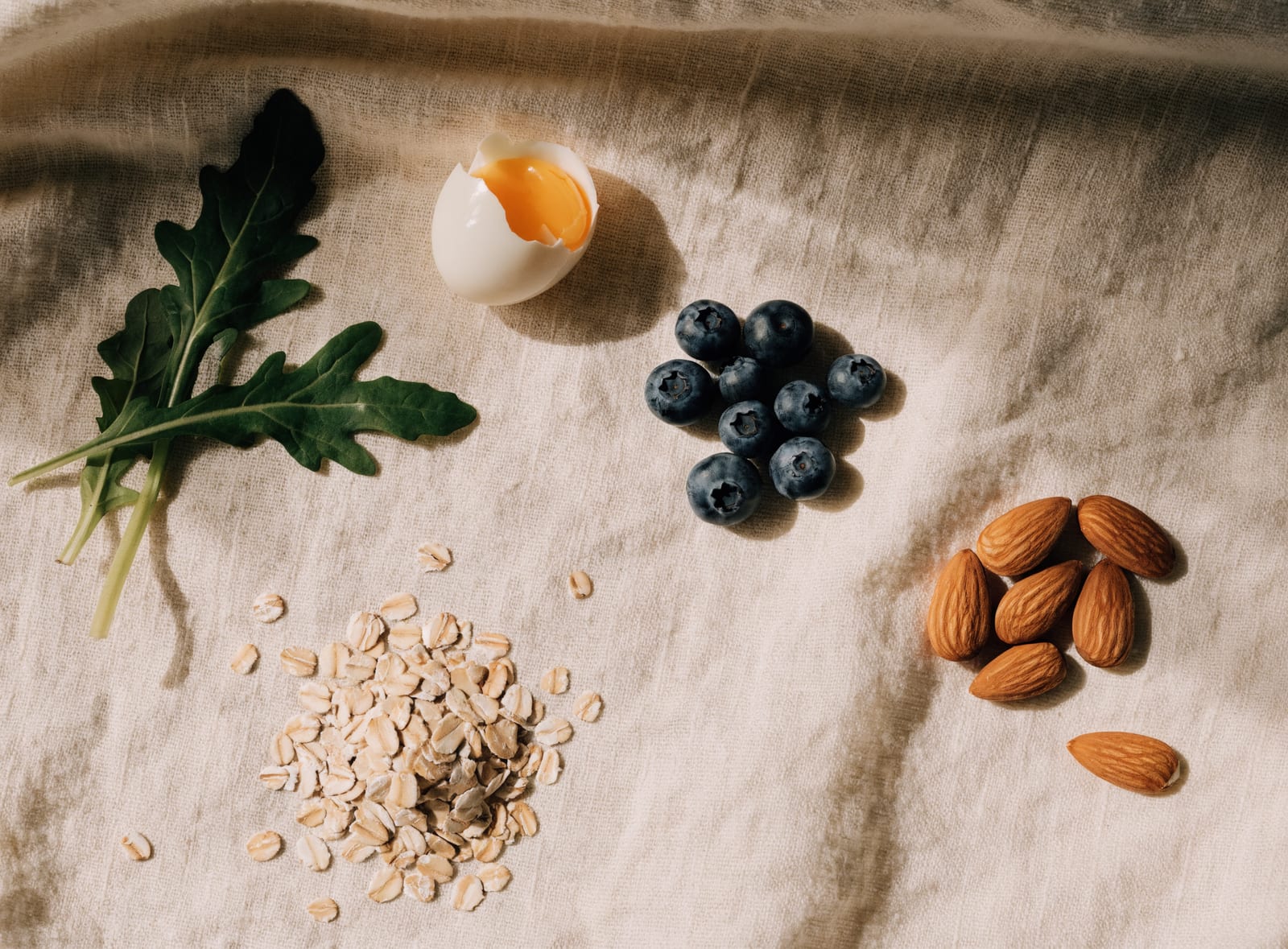 Fresh whole-food ingredients laid out on a kitchen counter